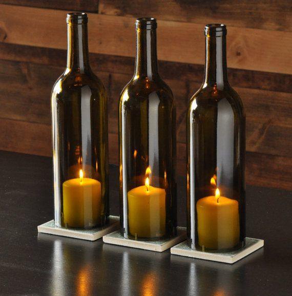 Repurpose your wine bottles and create wonderful candle lit grouping to add a warm twinkle to your rooms