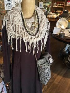 We also carry apparel and accessories at A Village Gift Shop.